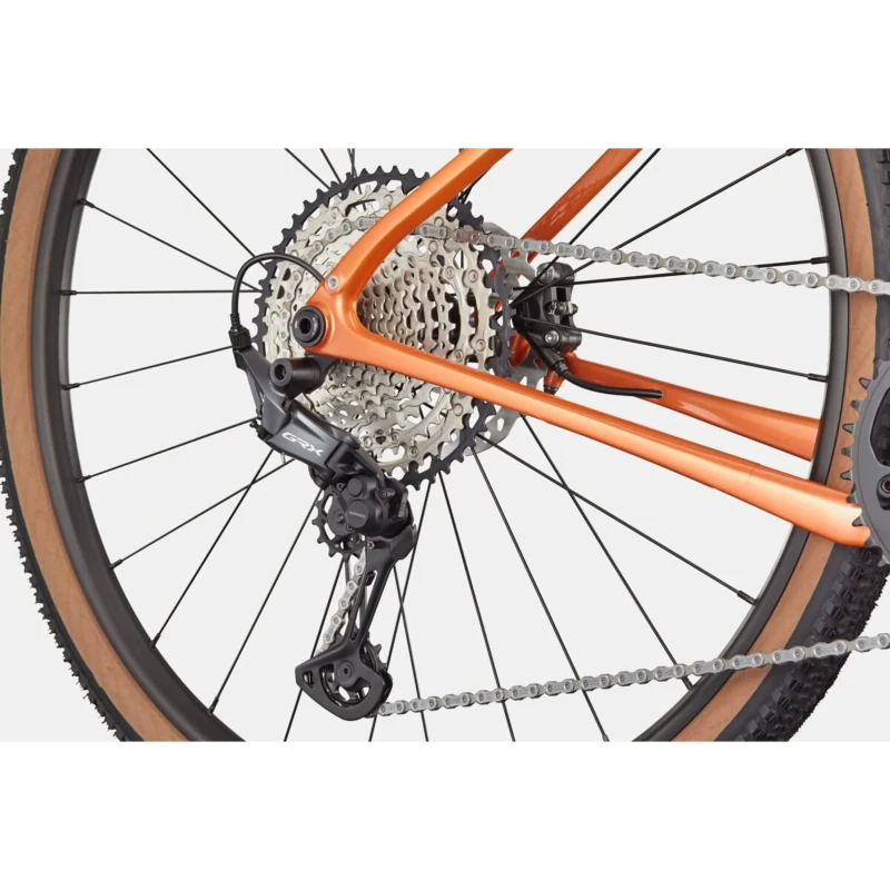 Rower gravel Cannondale Topstone Carbon 3 GRX 1x Pomarańczowy - widok piasty i łańcucha